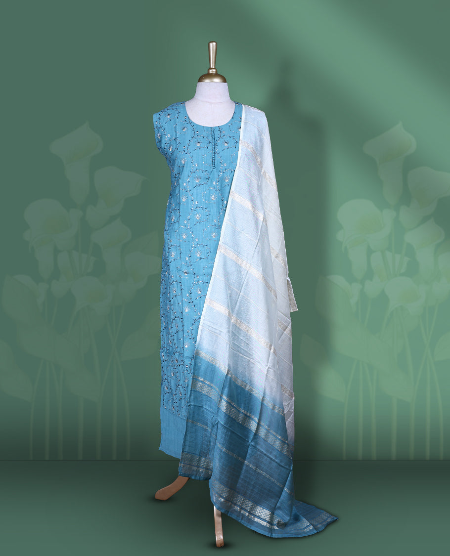 Blue colour churidar set featuring U neckline, sleeveless, and self colour and white colur floral kodi thread pattern across the body, Paired with a contrast white colour dupatta
