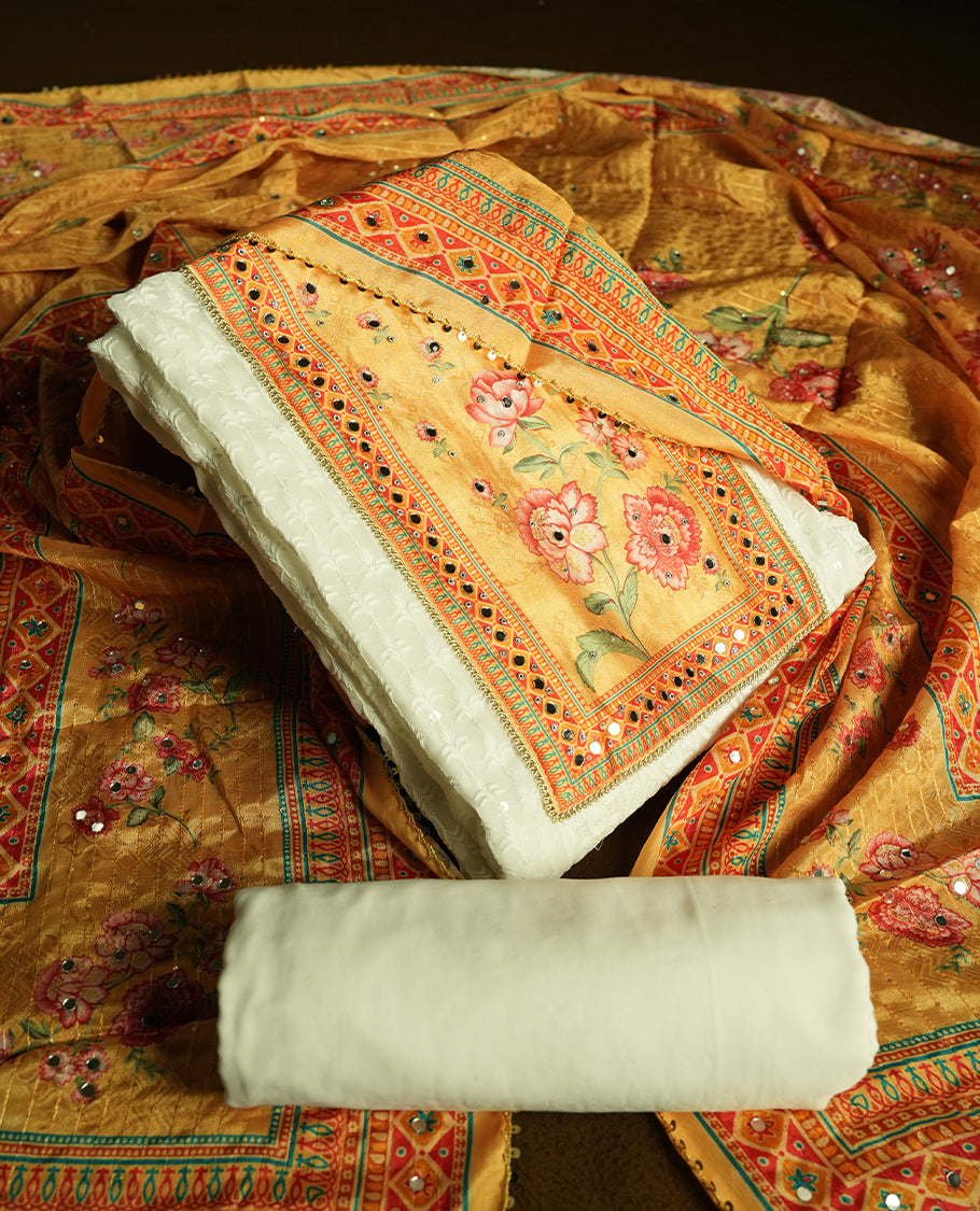 White colour churidhar material featuring Mirror and thread embroidery, foral print pattern on the contrast Yellow colour front panel, floral digital printed dupatta with elegant border, and matching plain bottom