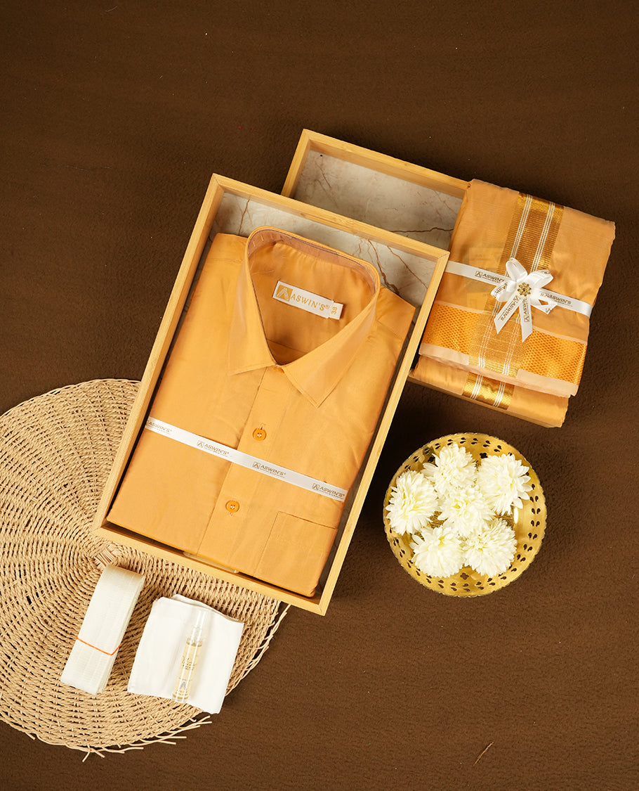 Gold colour Aswin’s wedding set featuring a refined silk shirt and matching dhoti with gold  zari detailing, crafted for timeless elegance and perfect for traditional weddings and festive occasions.