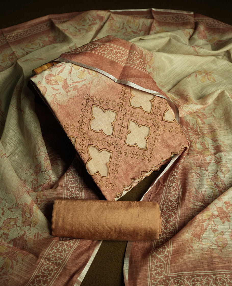 Soft Brown colour churidhar material featuring floral and cutwork embroidery on the front panel, digital floral printed dupatta with elegant border, and matching plain bottom.