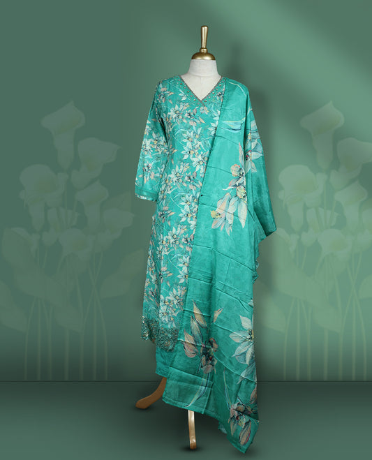 Aqua green colour churidar set featuring elegant white thread embroidery on the neckline, sleeves, and coloured floral pattern across the body, Paired with a matching dupatta