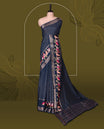 Navy Blue viscose saree featuring subtle checkered patterns and a beautifully embroidered bird motif border, paired with a rich pallu & perfect for festive occasions, celebrations, and elegant gatherings.
