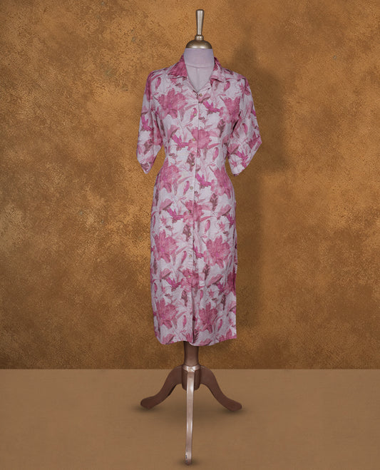 Pink floral colour BY VISMAY button down kurti  with an all over rose toned print, straight calf length silhouette, classic shirt collar, and elbow length sleeves.