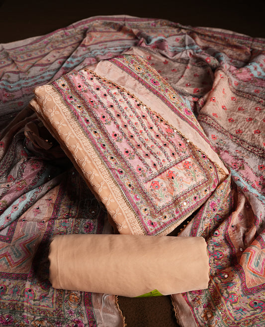 Walnut cream colour churidhar material featuring Mirror and thread embroidery, foral print pattern on the self colour front panel, floral digital printed dupatta with elegant border, and matching plain bottom