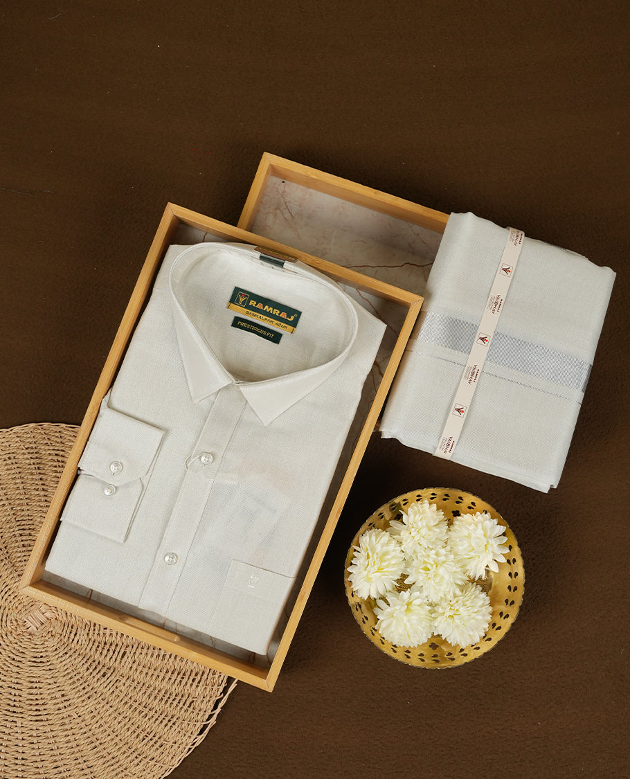RAMRAJ Silver Colour shirt paired with a matching dhoti, elegantly finished with a gold border.