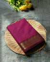 Magenta Chettinad cotton saree featuring a traditional gold zari maroon colour border with intricate temple motifs, soft texture, and elegant finish & Comes with a matching blouse for a classic ethnic look.