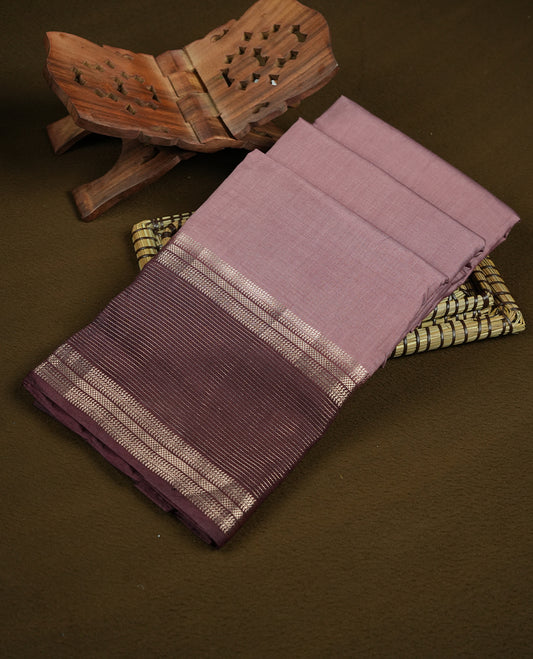 Dusty pink and brown colour mixed chanderi cotton saree with plain body, deep brown pallu, silver zari striped border, matching brown blouse.