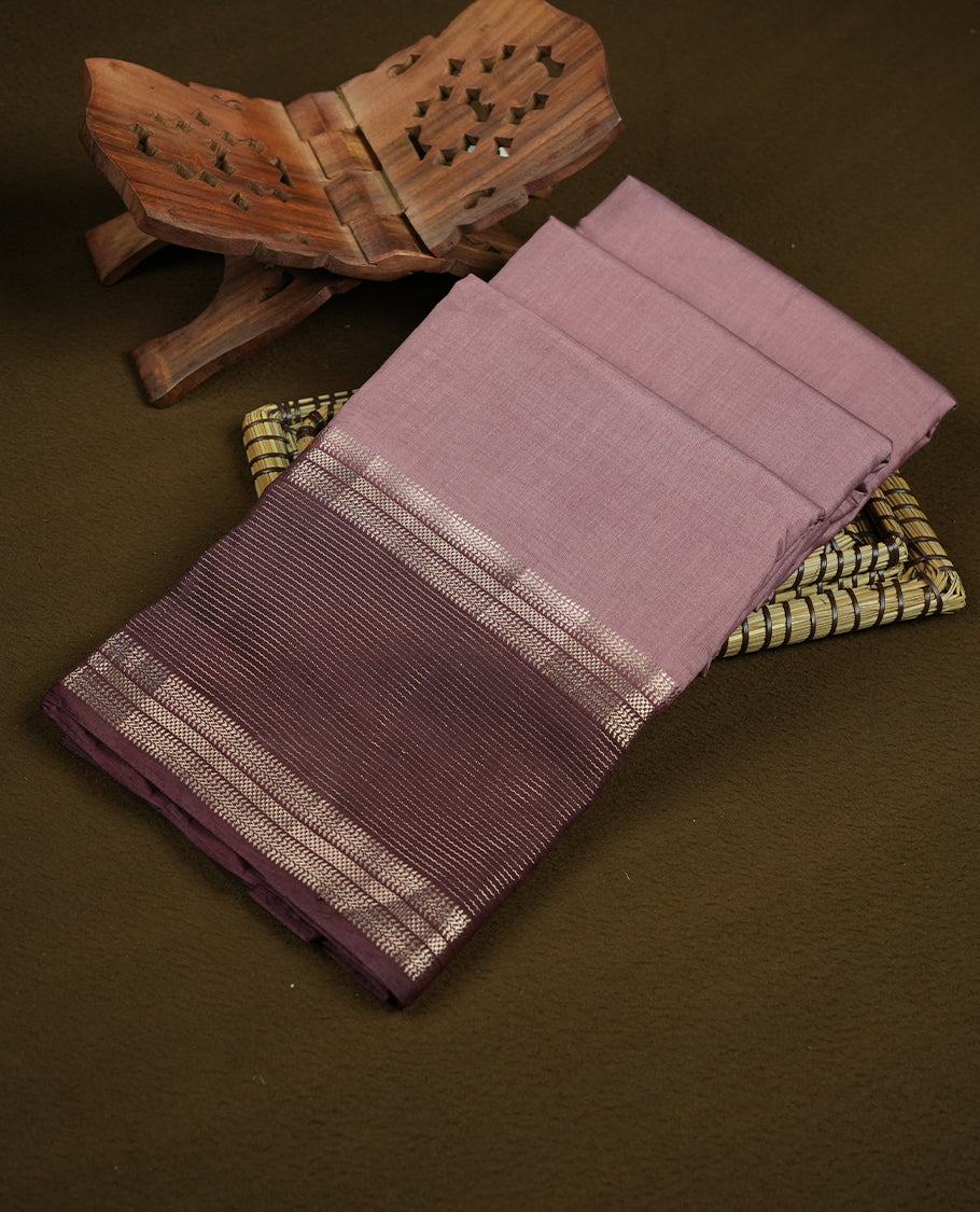 Dusty pink and brown colour mixed chanderi cotton saree with plain body, deep brown pallu, silver zari striped border, matching brown blouse.