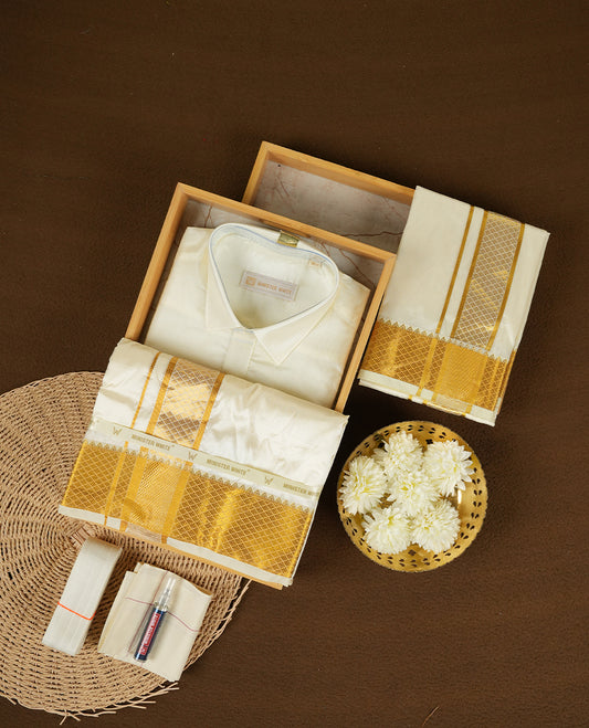 Cream gold coloured silk wedding shirt, dhoti, and towel set from MINISTER WHITE, featuring a gold zari border.