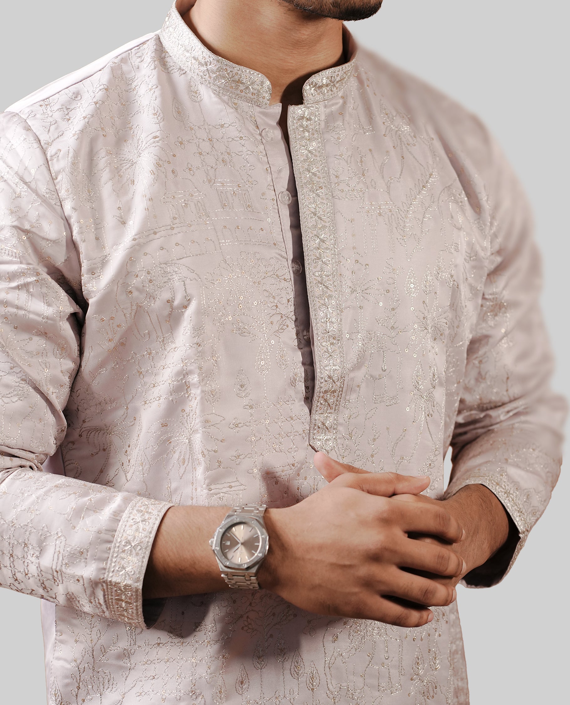 Light Lavender colour men's kurta featuring elegant thread and sequins work on the body, complemented by full sleeves for a refined and festive look.