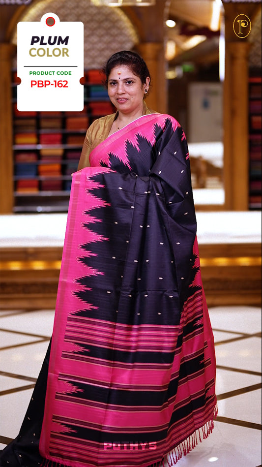 Black color saree with a small beige colour motifs on body, vibrant pink pallu, and dual tone border & paired with a matching blouse for a complete look.