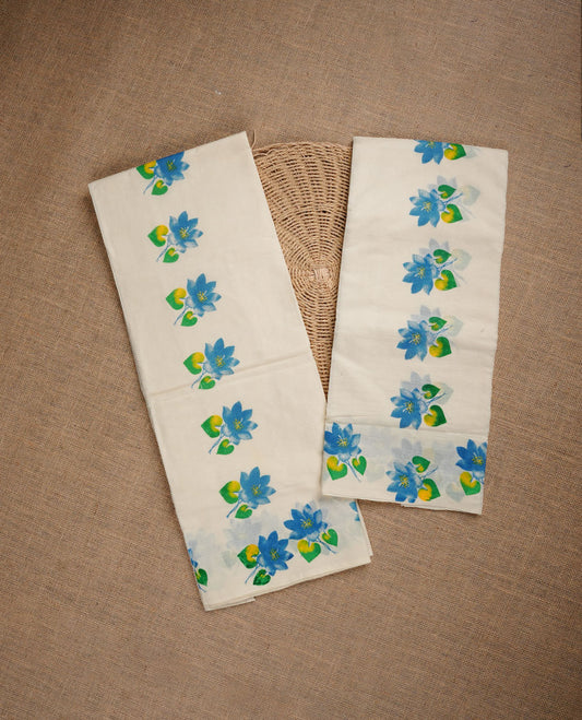 Cream colour cotton set mundu highlighting blue floral print border.
