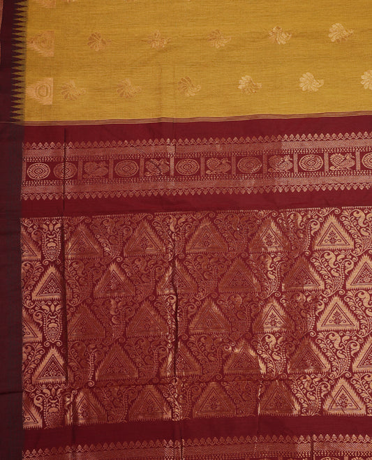 Mustard colour Kalyani cotton saree adorned with zari woven buttas across the body, paired with a rich Maroon colour traditional zari border and pallu, with matching blouse.