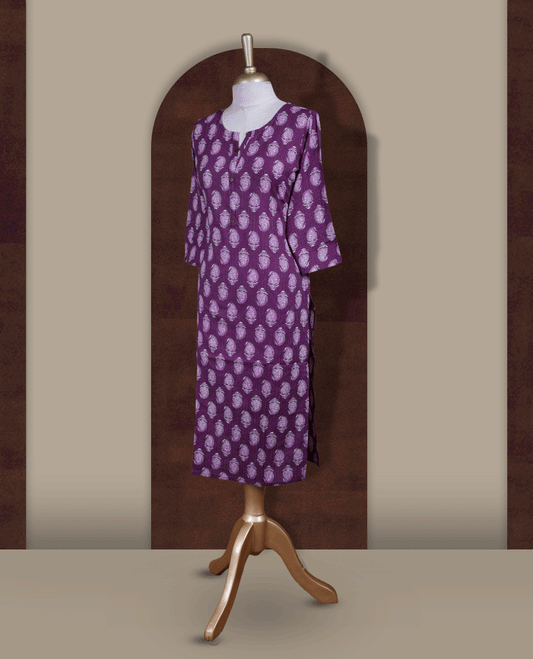 Purple colour kurthi adorned with delicate white paisley prints, featuring a stylish V notch round neckline and comfy 3/4th sleeves & Designed in a straight cut silhouette for a graceful, everyday look.