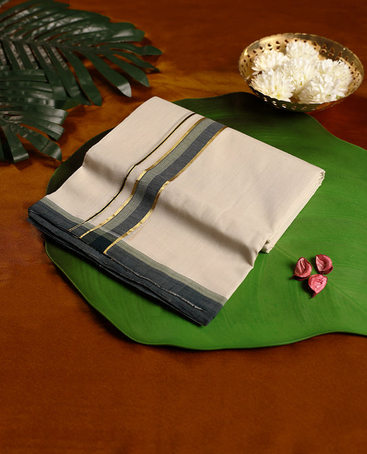 Off white colour pure handloom cotton double dhoti featuring a bold grey kara highlighted with golden zari edging, crafted for traditional elegance and lasting comfort, perfect for festive and cultural wear.