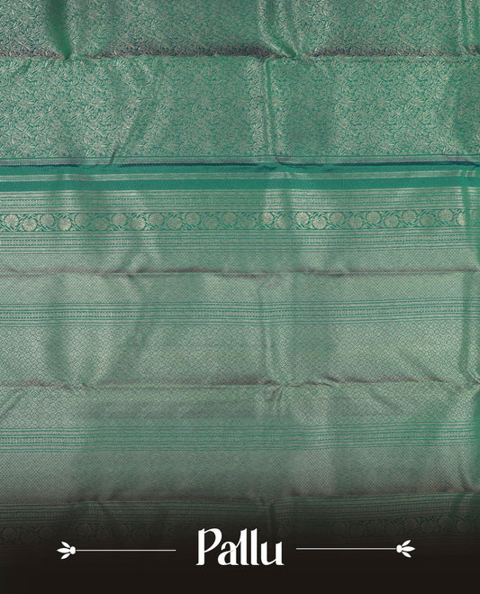 Peacock green colour Kanchipuram pattern Manthrakodi saree featuring floral and leaf motifs zari kodi antique gold jacquard kanchipuram traditional & zari turning border and zari jacquard blouse piece.