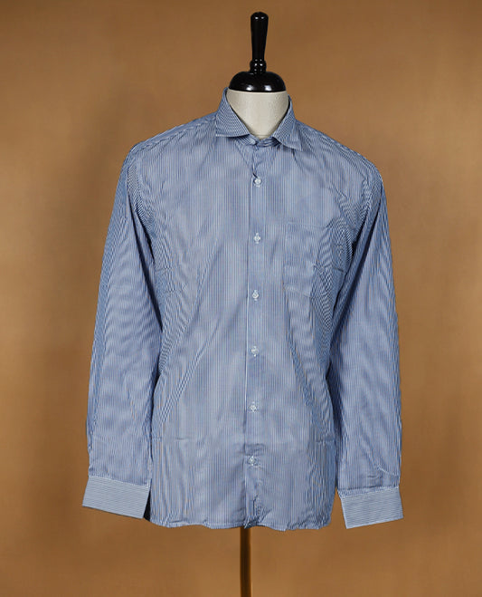 Sky blue Peter Eglend men's formal shirt in a soft cotton blend, featuring fine white vertical pinstripes, full sleeves with contrast cuffs, classic collar, and a chest pocket.