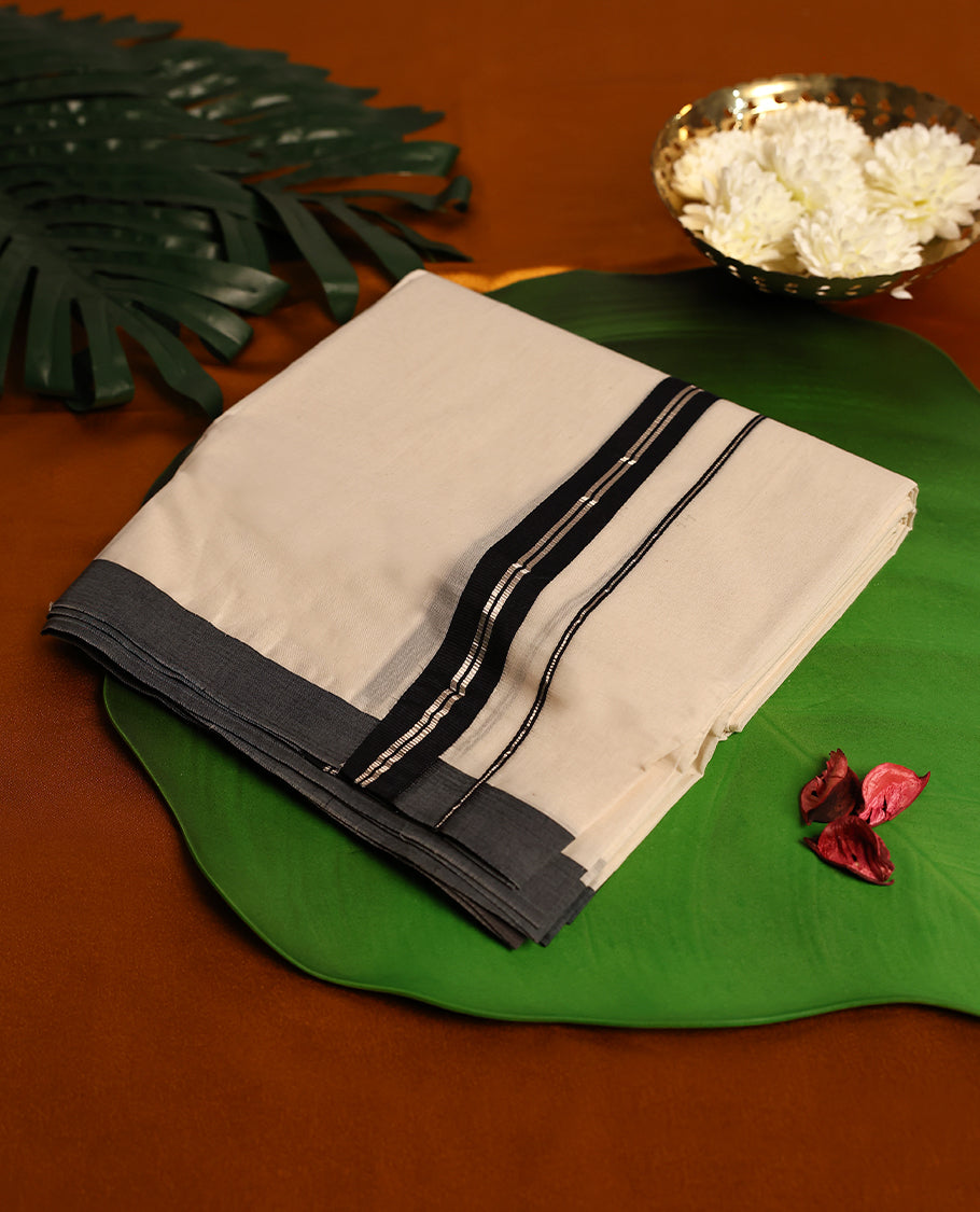 Light ivory Colour cotton double dhoti with One Inch Black kara, crafted for traditional elegance & comfort, for men.