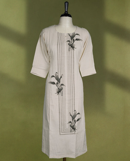 Off white colour kurti featuring a round neckline and three quarter sleeves, enhanced with vertical panel stitch detailing and minimal floral prints