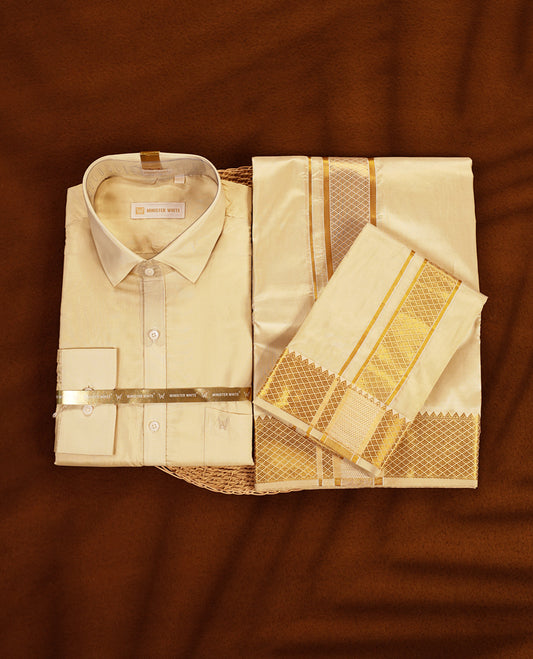 Fawn gold coloured silk wedding shirt, dhoti, and towel set from MINISTER WHITE, adorned with an elegant gold zari border, making it an ideal choice for weddings, festive occasions, and traditional celebrations.