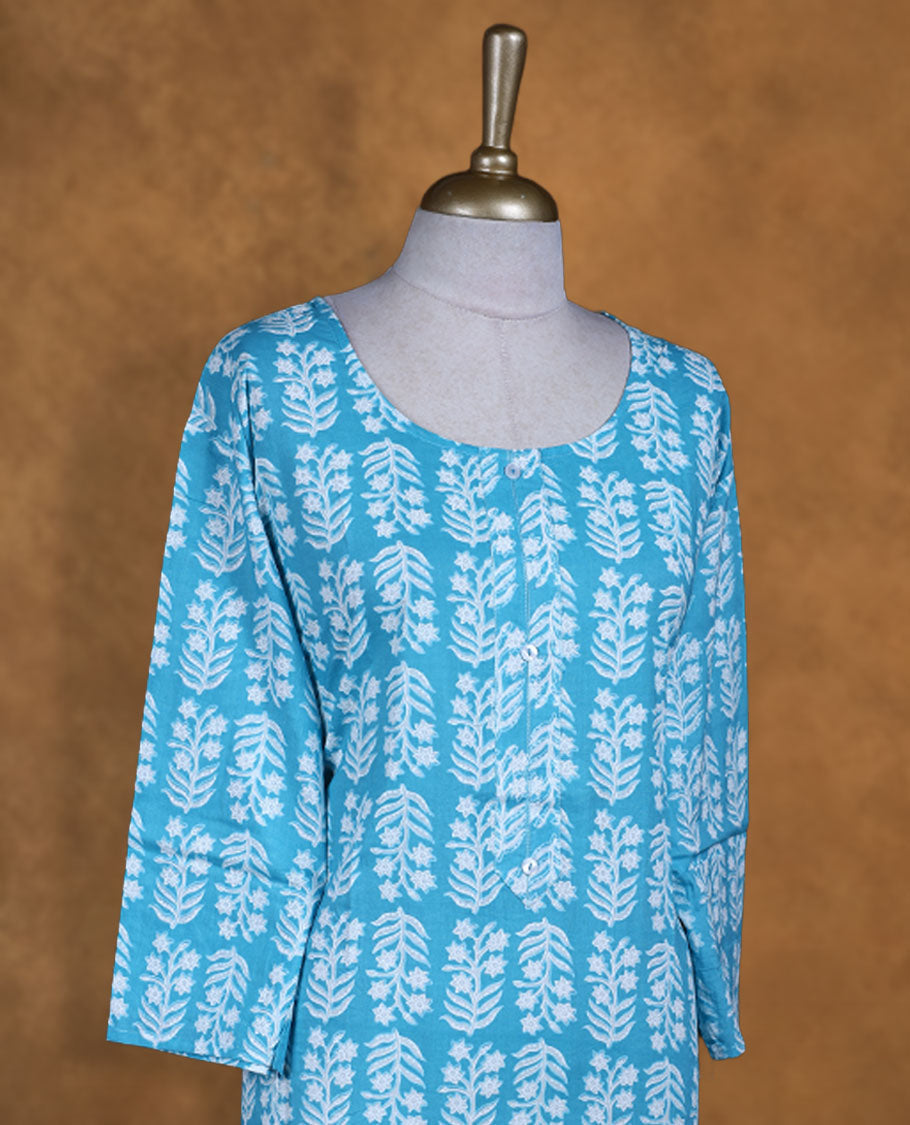 Sky and white colour kurti with White floral prints, knee length design, styled with a round neckline and a sleeve .