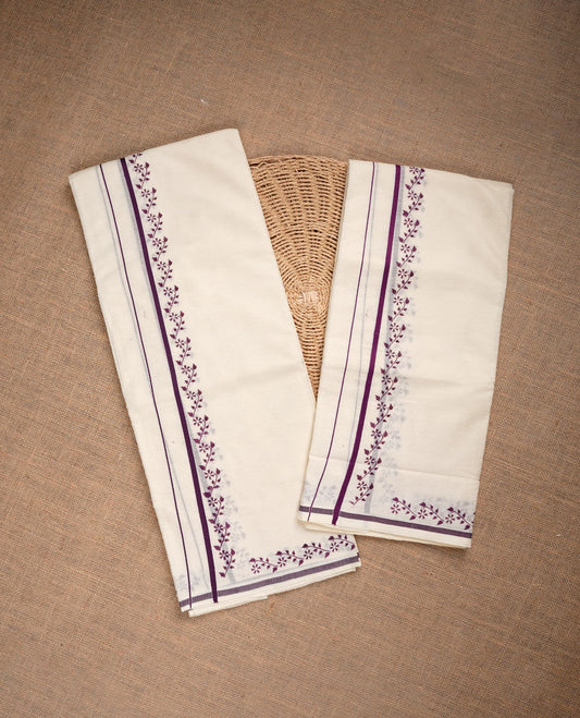 Cream colour cotton set mundu highlighting purple colour simple with floral print border.