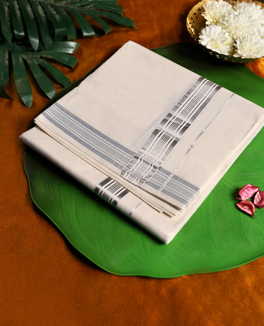 Classic off white colour cotton dhoti adorned with a sleek silver zari border featuring subtle striped detailing, combining comfort and elegance, perfect for traditional functions and festive wear.
