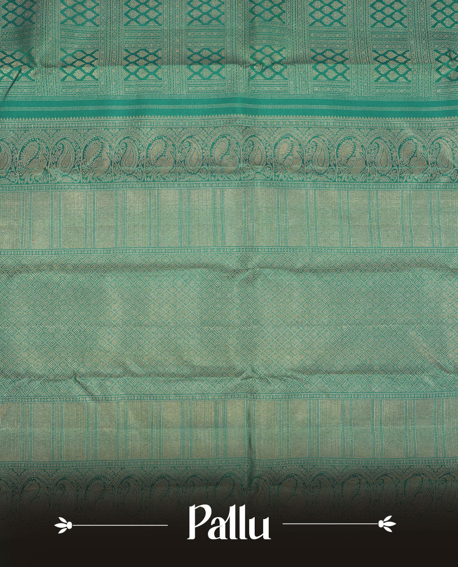 Turquoise blue colour Kanchipuram pattern Manthrakodi saree featuring golden zari box jacquard with small zari motifs across the body, traditional zari border, zigzag bavanji detailing, and plain zari blouse piece.
