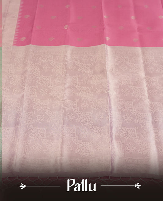 Rose Pink colour Semi Silk Saree with Subtle Zari Butta Motifs on the Body, Contrasting Silver Zari Woven Pallu and Border Featuring Intricate Patterns and Tassels, Paired with Coordinated Blouse Piece