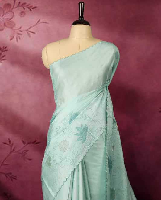Pastel aqua colour pure tussar silk lightweight saree with self colour floral kodi embroidery and tissue fabric applique work on the body, scallop embroidery worked border, with matching self colour plain blouse