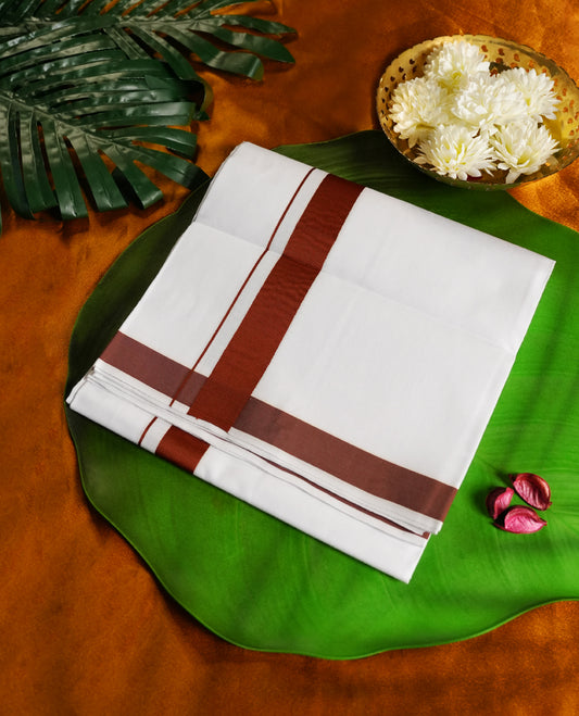 White colour cotton dhoti with a bold rust brown border. Soft, breathable, and ideal for traditional ceremonies, temple visits, or festive wear. A perfect blend of simplicity and style.
