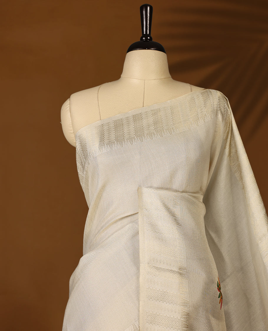 Light gold colour Organza Kerala saree featuring  a sheer, smooth body, light Kasavu border, Kathakali printed pallu, Comes paired with a coordinated matching blouse.