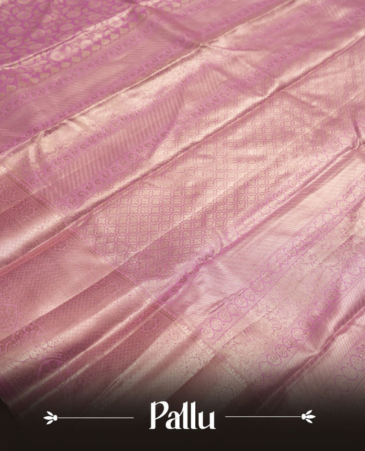 Pink colour and Antique silver Zari Tissue Brocade Saree features intricate floral Motifs on body and fancy border & pallu with floral patterns, paired with matching blouse