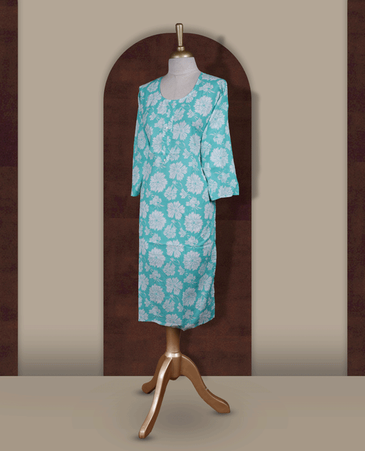 Light aqua colour kurti featuring bold white colour floral prints, a round neckline with front button detailing, and comfortable 3/4th sleeves.