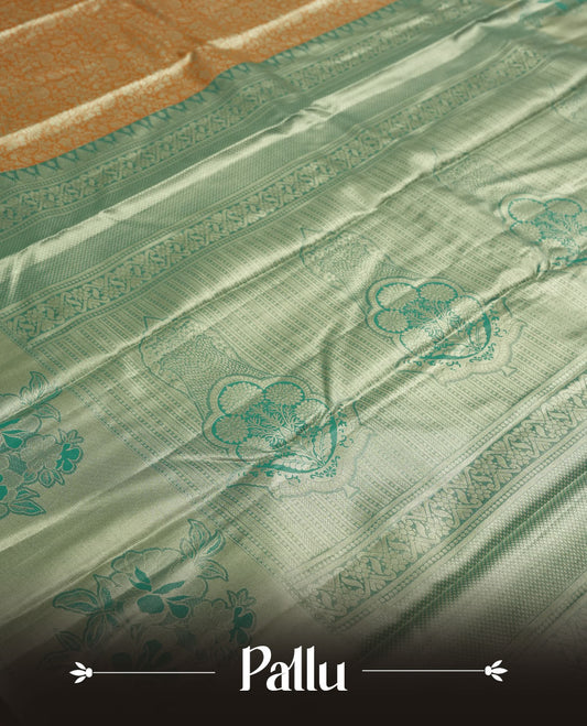 Mustrad orange colour and Antique gold Zari Tissue Brocade Saree features intricate floral Motifs on body and pastel green colour fancy border & pallu with floral patterns, paired with matching blouse