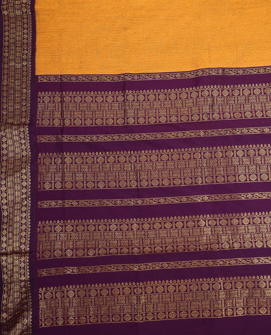 Bright Mustard colour mixed Kalyani cotton saree featuring Gold zari checks throughout the body, paired with Deep Grape colour traditional border and pallu, with matching blouse