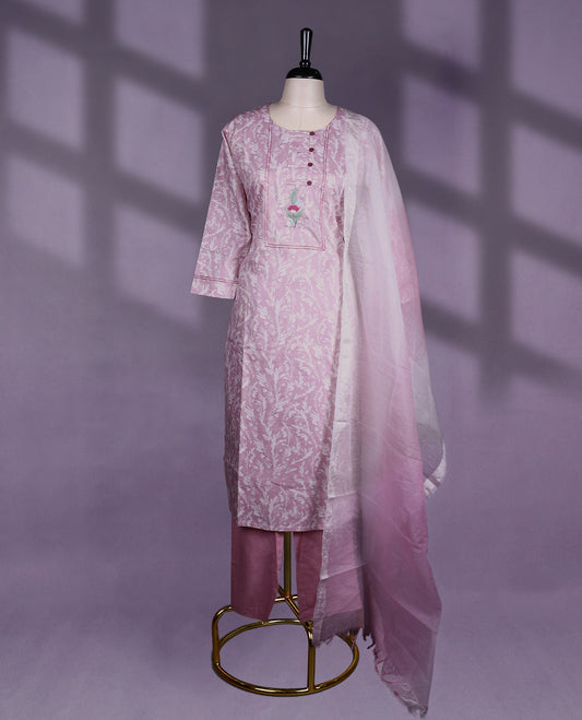 Light pink colour kurta set featuring three-quarter sleeves, a round neckline with button detailing and floral Work, paired with matching pants and a soft ombré dupatta for a charming, everyday ethnic look