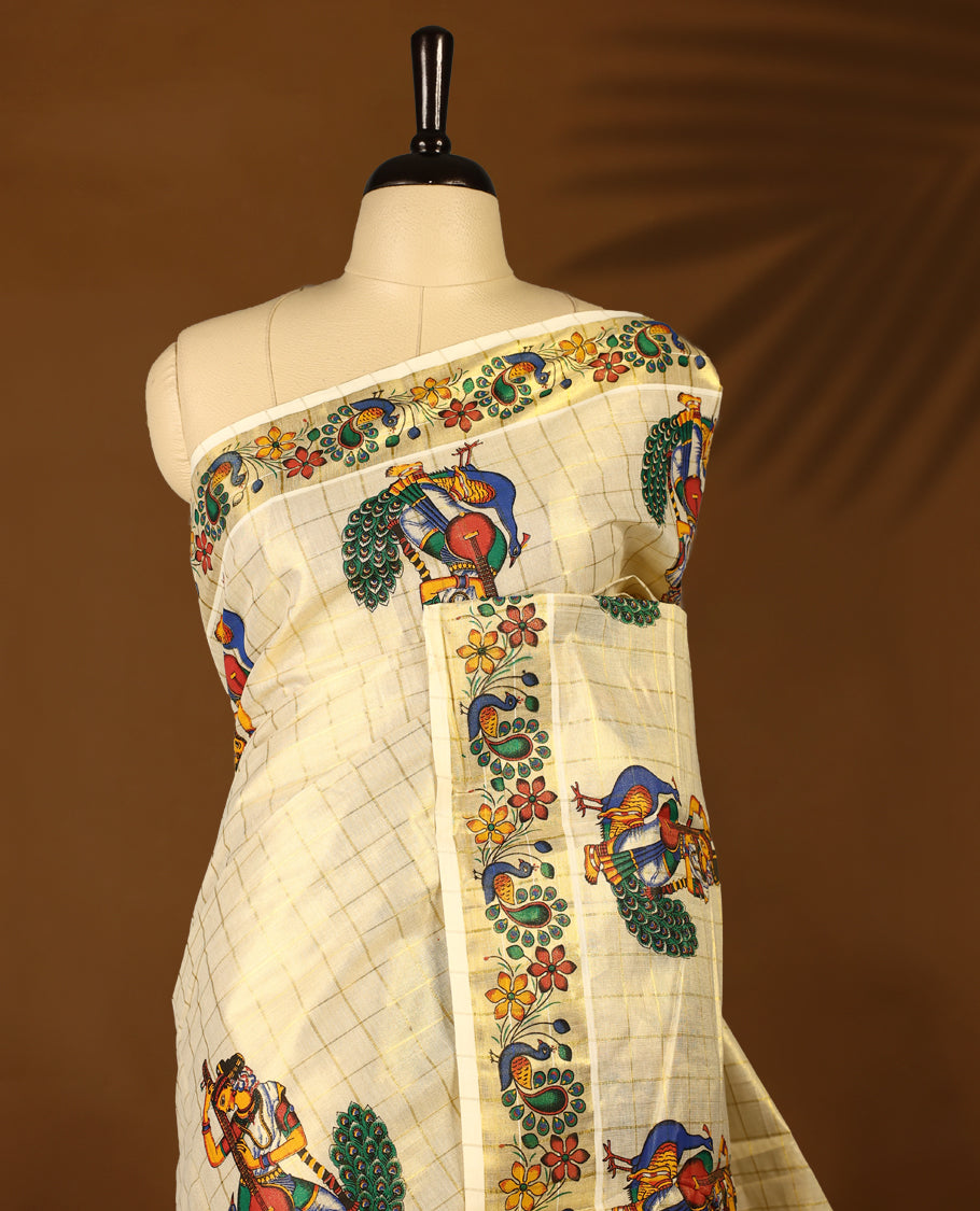 Light Gold colour Tissue Kerala saree featuring Peacock with lady print work on checked body and a beautifully woven Gold Kasavu border, paired with a matching blouse perfect for festive occasions.