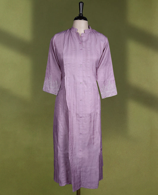 Sophisticated lavender colour kurti with a mandarin collar, vertical pintucks, button down front, and 3/4th sleeves adorned with delicate embroidery.