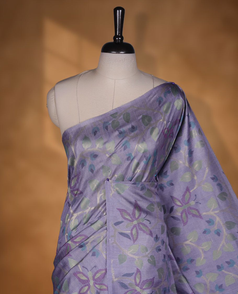 Lavender colour semi jamdani tussar saree featuring woven Floral kodi & butterfly motifs on the body, complemented by a self colour without border pallu, paired with a matching blouse.