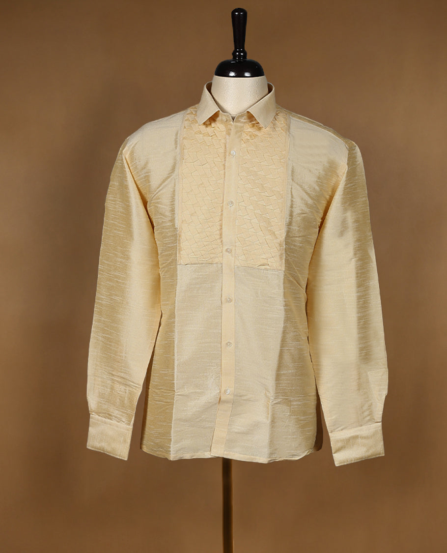 Cream ivory DH men's semi silk wedding shirt with a glossy finish, featuring intricate diamond jacquard pleats on the front panel, full sleeves, classic collar, and a chest pocket.