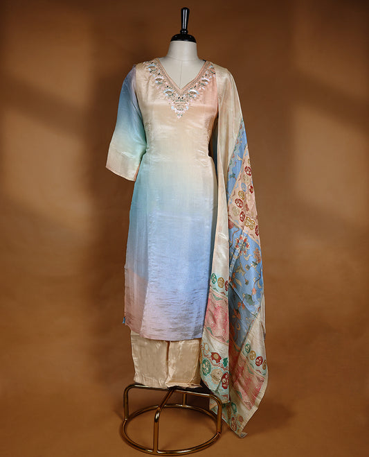 Multi shade salwar from TWARA, featuring a V-neck, adorned with cut beads, sequins, and beadwork, paired with a matching bottom and a multi colour digital printed dupatta.