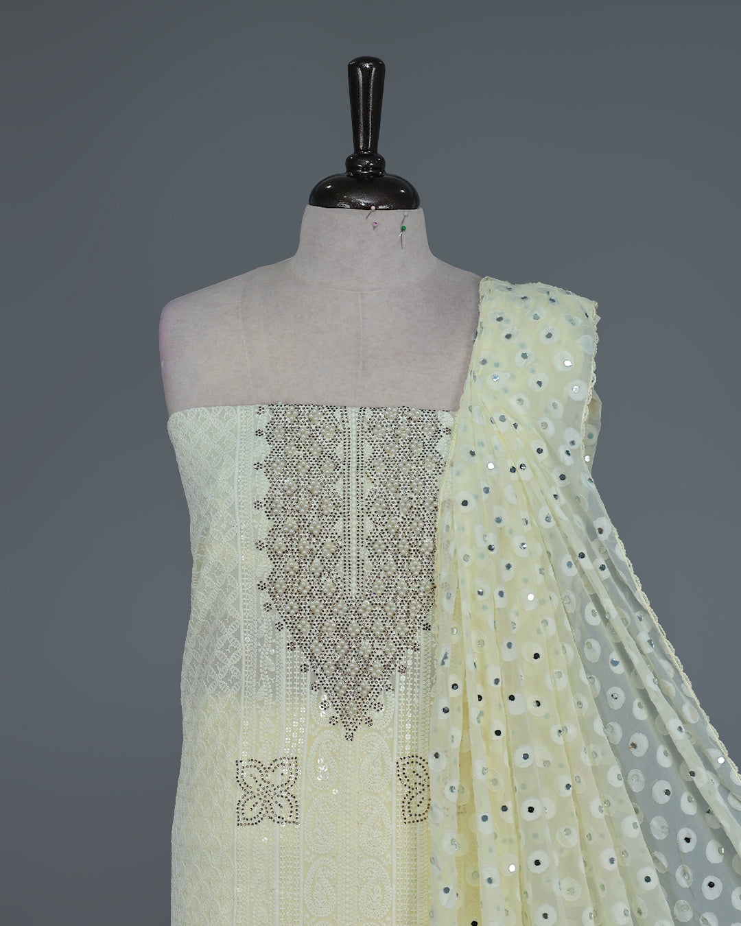 Butter Yellow Colour  Georgette Salwar Material featuring elegant Chikankari work on the kurta, paired with a matching bottom and a sequins-embellished dupatta.