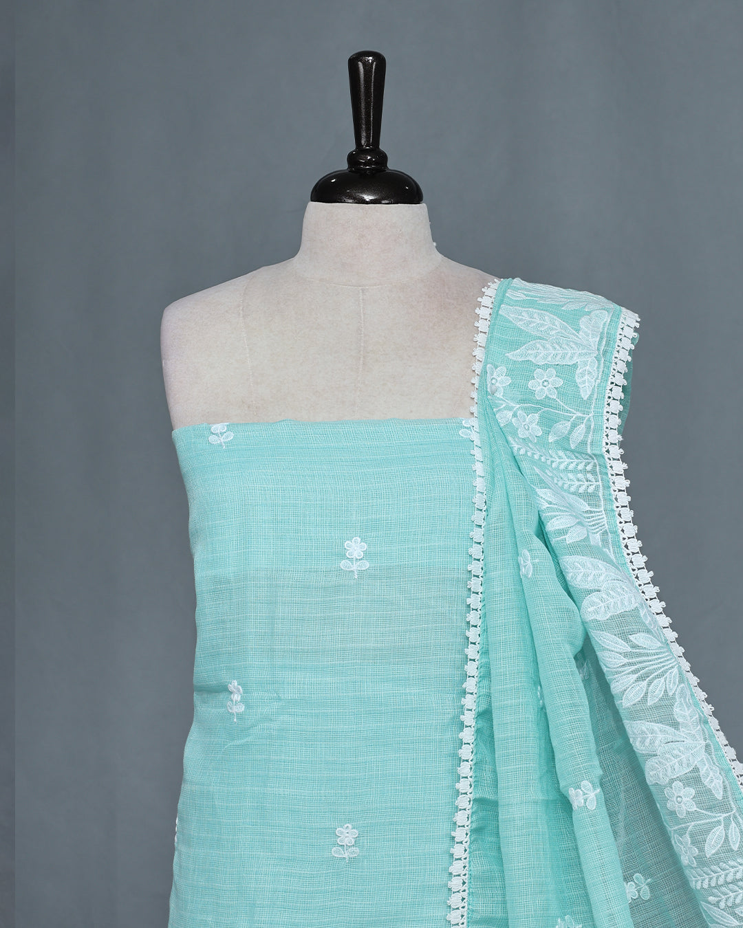 Aqua Blue Colour Kotta Net Salwar Material featuring elegant white floral thread embroidery on the kurta, paired with a matching bottom and a beautifully embroidered dupatta.