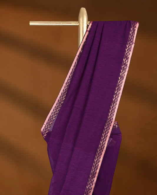 Magenta Purple colour soft khadi cotton saree with plain body, detailed woven Gold zari border, paired pallu with tussles, with matching blouse.