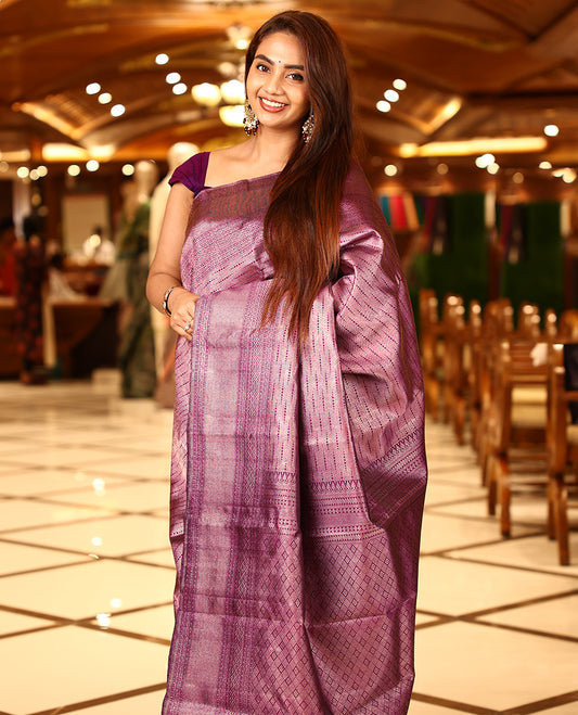 Grape colour pure Kancheepuram brocade silk saree featuring a micro dot brocade body, chattari brocade border, pallu woven with Vangi star design, paired with a matching brocade blouse