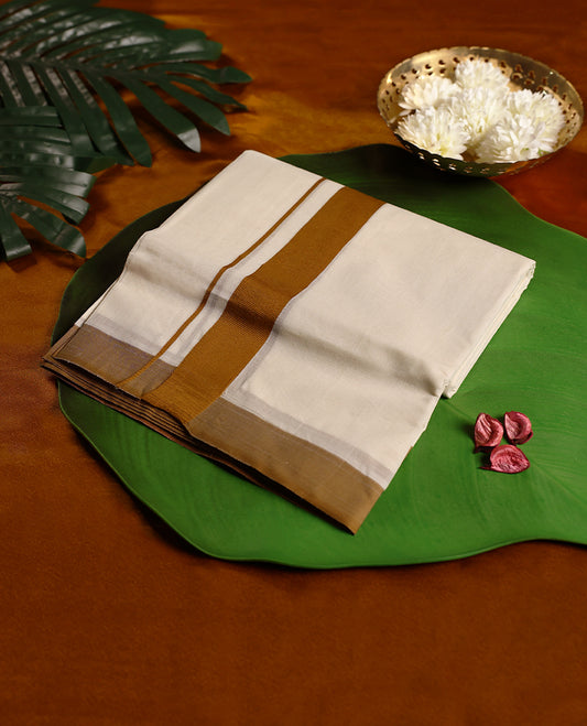 Ivory handloom pure cotton double dhoti featuring a golden brown border with fine detailing, crafted in a traditional yet elegant finish, ideal for festive and cultural occasions.