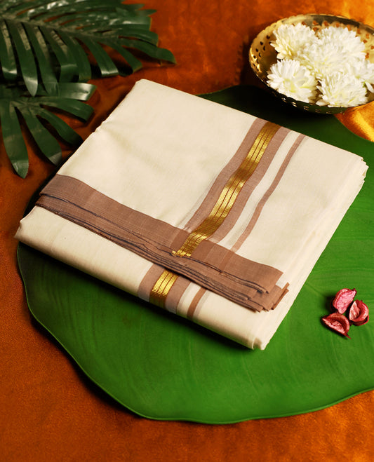 Classic off white colour pure handloom cotton dhoti detailed with a sandal colour border and golden zari stripes, blending tradition and elegance, perfect for weddings, rituals, and festive celebrations.