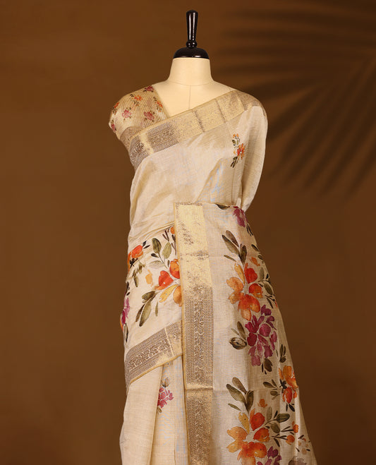 Ivory tussar Kerala saree adorned with intricate floral Digital Prints, complemented by a rich zari border, detailed pallu with matching Blouse