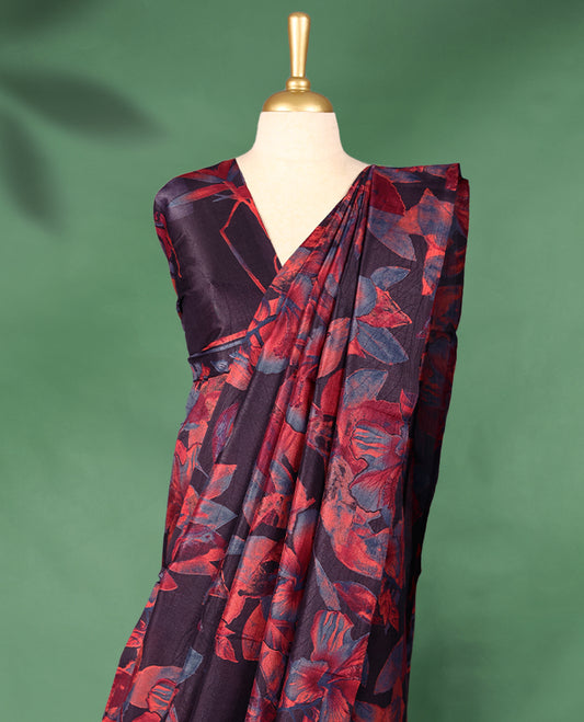Dark Shade Manipuri saree adorned with oversized floral motifs in rich shades of crimson red and indigo blue with a smooth borderless finish that highlights the vivid floral pattern and comes with a matching blouse